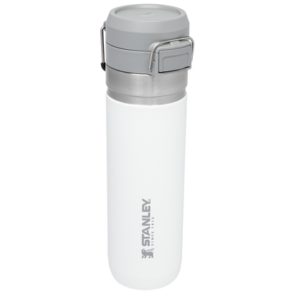 Side view of a white Stanley Quick Flip Bottle with the clips visible at the top and the Stanley logo on the side