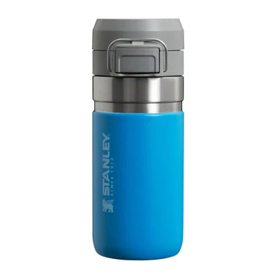 Side view of a blue Stanley Quick Flip Bottle with the clips visible at the top and the Stanley logo on the side