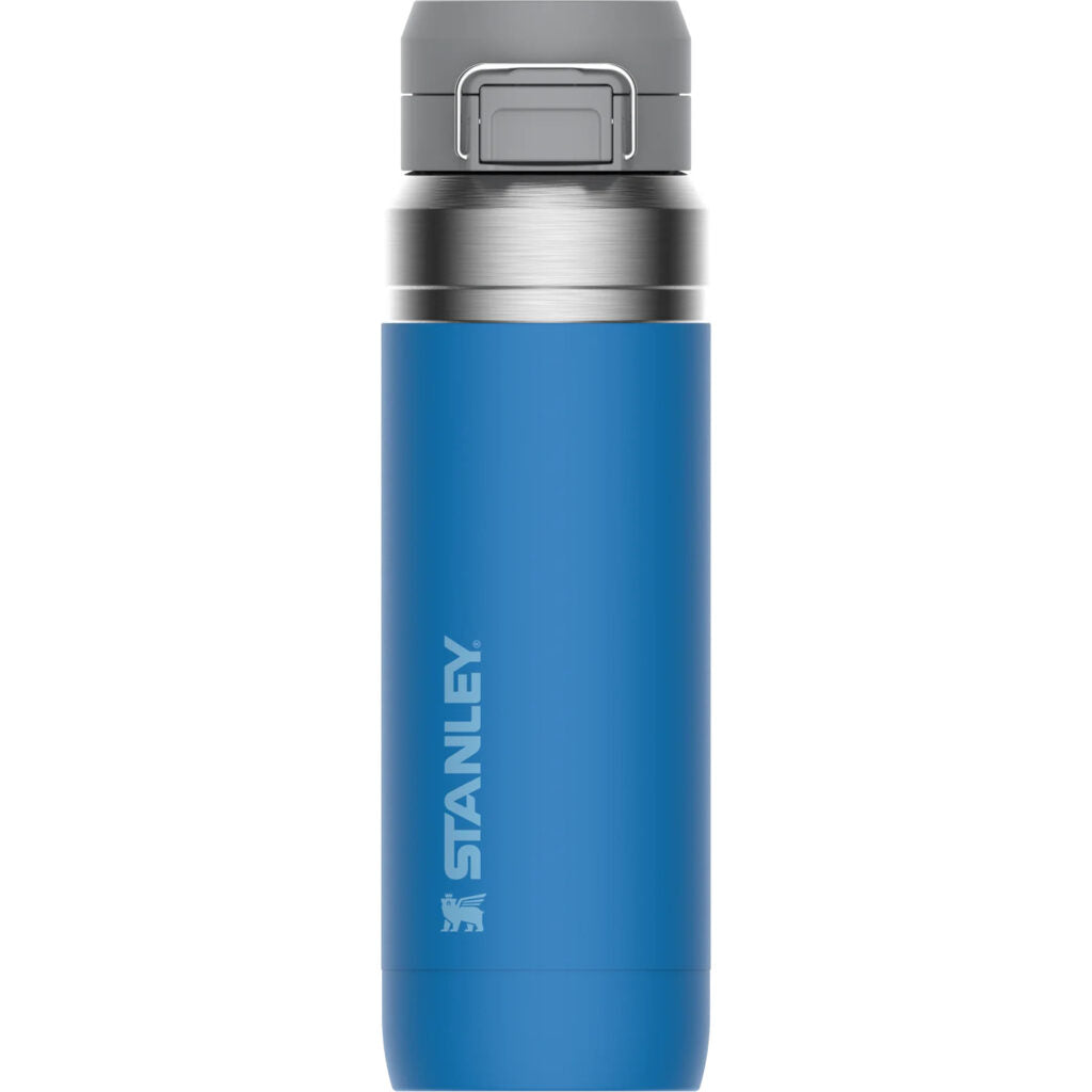Side view of a blue Stanley Quick Flip Bottle with the clips visible at the top and the Stanley logo on the side