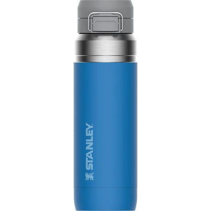 Side view of a blue Stanley Quick Flip Bottle with the clips visible at the top and the Stanley logo on the side